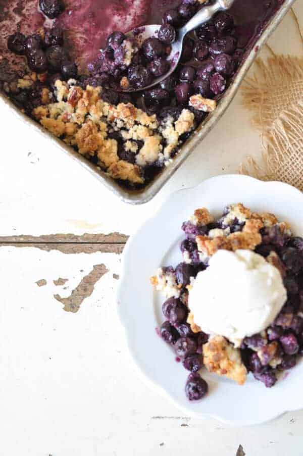 Gluten Free dessert with blueberries, lemon, arrowroot starch, almond flour, coconut sugar, pecans, maple syrup and coconut oil
