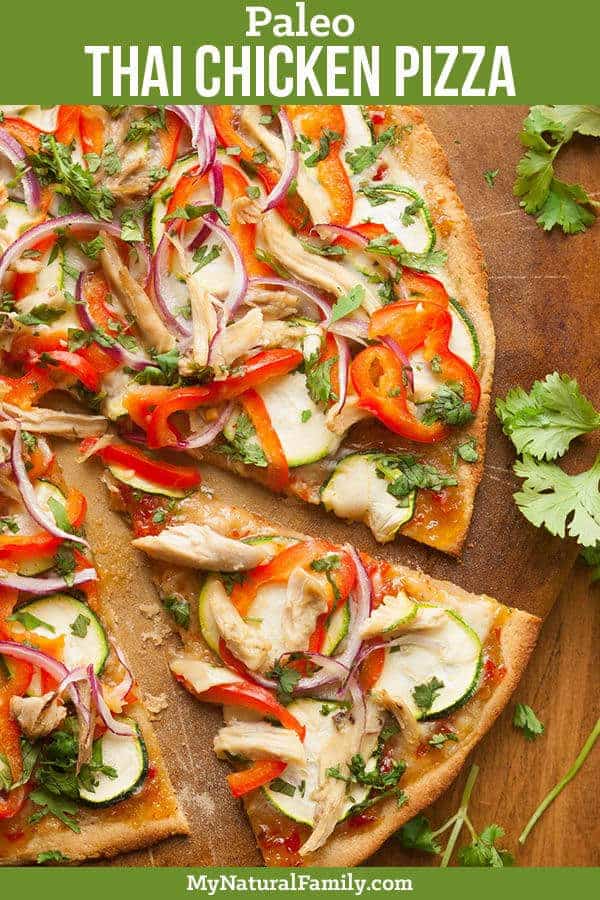 Thai Chicken Paleo Pizza Recipe with Paleo Sweet Chili Sauce. This pizza has a bold flavor and features fresh, crisp vegetables and bright colors. #mynaturalfamily #paleo #paleorecipes #healthyeating #healthyrecipes #healthyfood