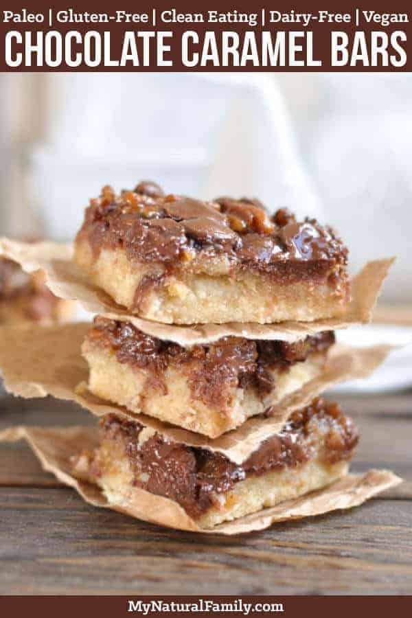 These Paleo pecan pie bars have a light, thick crust topped with a Vegan caramel and chocolate chip topping. {Gluten-Free, Clean Eating, Dairy-Free, Vegan} #mynaturalfamily #paleo #paleorecipes #healthyeating #healthyrecipes #healthyfood