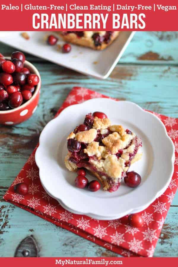 I love how the tang from the cranberries compliments the sweet crust in this Paleo cranberry bars recipe. Plus, it's easy and fun to throw together and looks so pretty and festive. #mynaturalfamily #paleo #paleorecipes #healthyeating #healthyrecipes #healthyfood