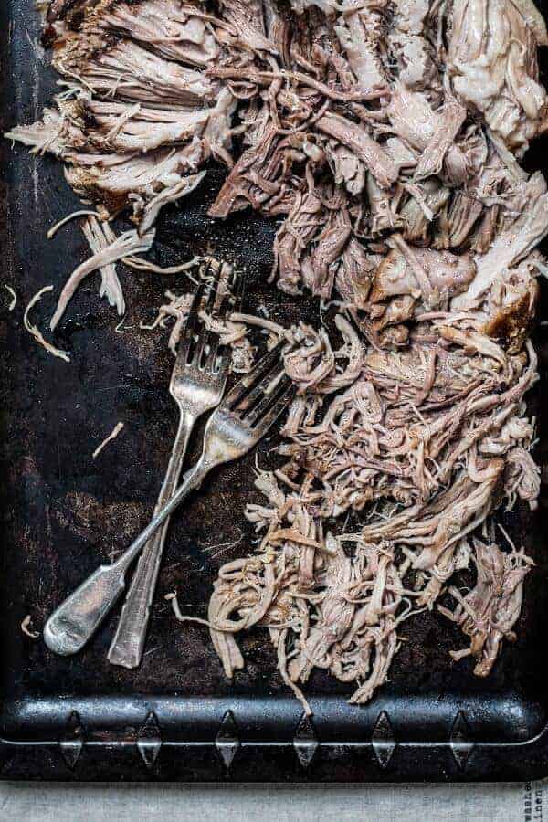 Paleo pork shoulder cooked in the slow cooker and shredded with a fork