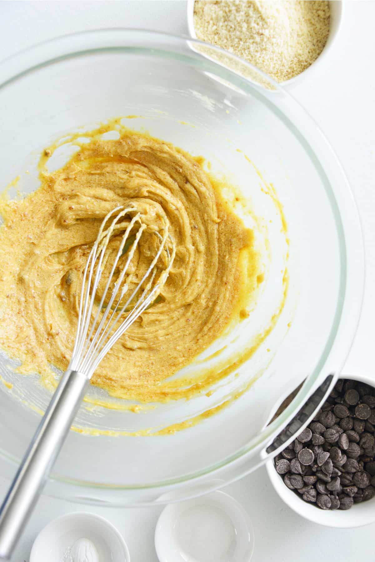 Whisk in the egg yolk, milk, and vanilla